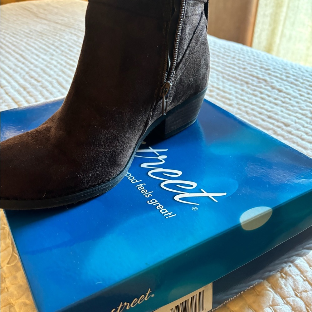 Women’s brown suede booties with side zip tassel